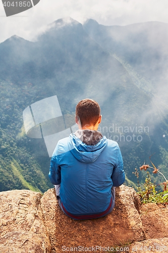 Image of Tourist in mountains