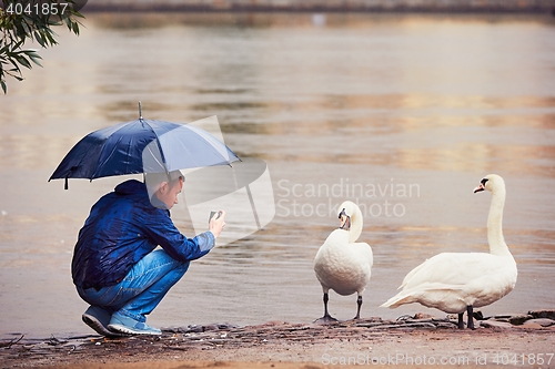 Image of Man in rainy day