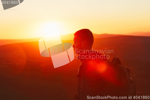 Image of Traveler at the sunset