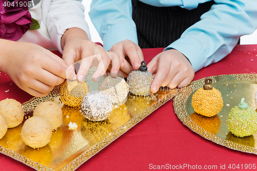 Image of Children making christmas dessert