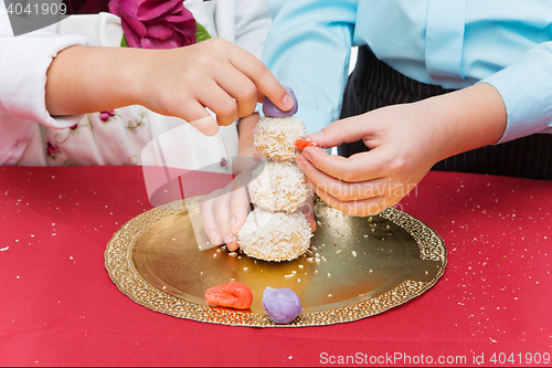 Image of Children making christmas dessert