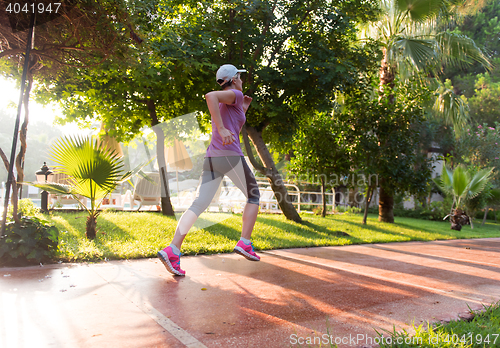 Image of sporty woman jogging