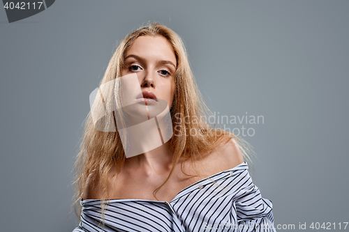 Image of Sensual woman in unbuttoned shirt