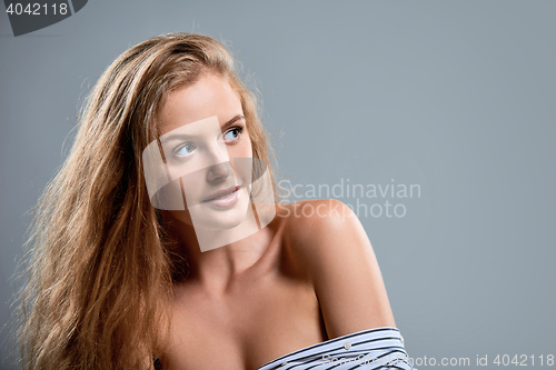 Image of Sensual woman looking away at blank copy space