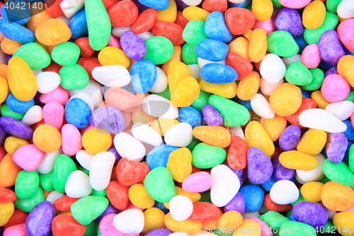 Image of boulders with plastic colors 