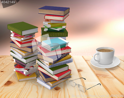 Image of The piles of books and notebooks on a wooden table.