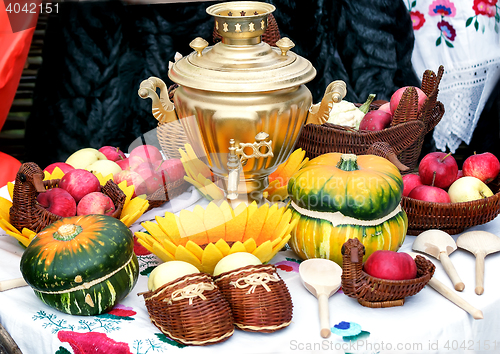 Image of On the table for tea is a beautiful samovar .