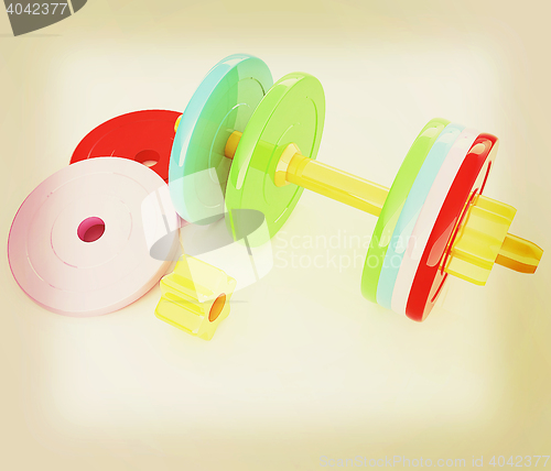 Image of Colorful dumbbells are assembly and disassembly on a white backg