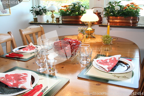 Image of Laid table with crayfish