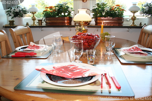 Image of Laid table with crayfish