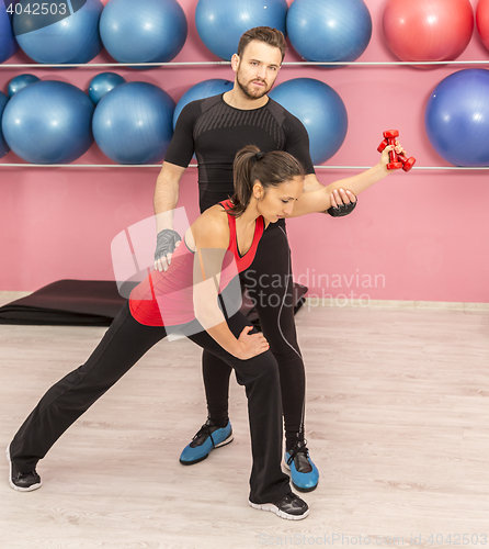 Image of Couple Training in a Gym