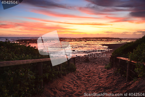 Image of Sandy path to the beach at dawn sunrise