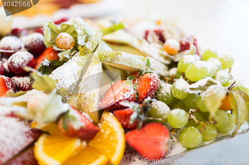 Image of close up of dish with sugared fruit dessert
