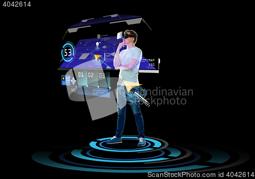 Image of happy man in virtual reality headset or 3d glasses