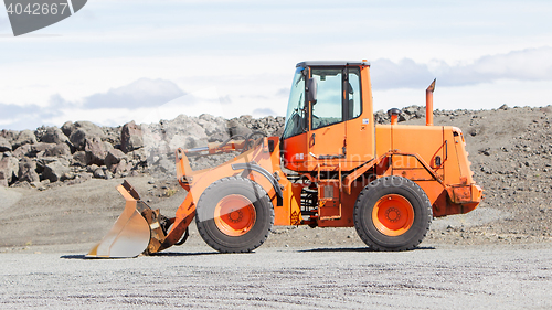 Image of Large orange bulldozer