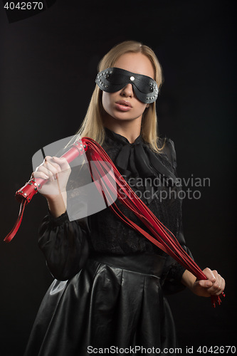 Image of Portrait of young beautiful woman in blindfold