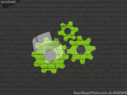 Image of Data concept: Gears on wall background