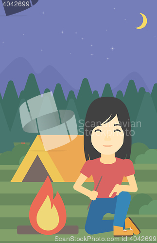 Image of Woman kindling campfire vector illustration.