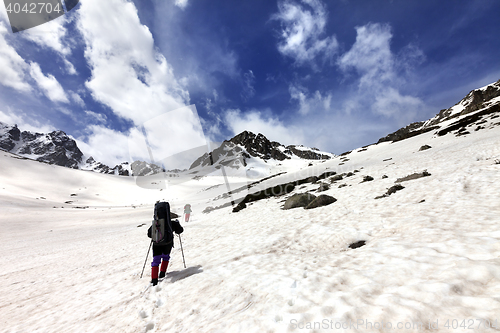 Image of Two hikers in snow plateau