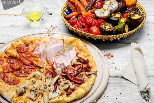 Image of Delicious meat pizza