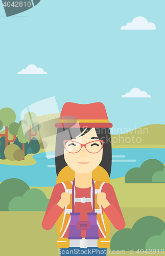 Image of Cheerful traveler with backpack.