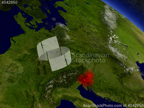 Image of Slovenia from space highlighted in red