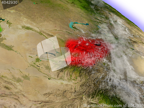 Image of Kyrgyzstan from space highlighted in red