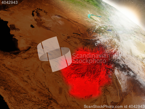 Image of Afghanistan from space highlighted in red