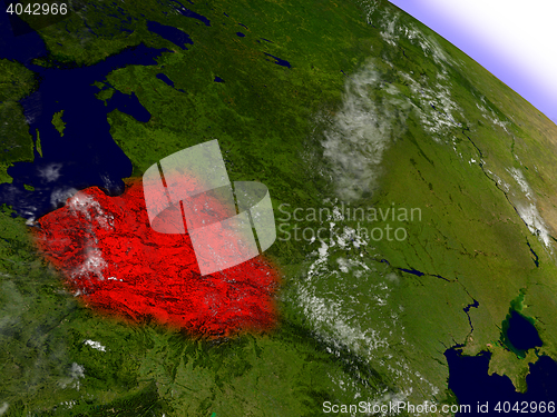 Image of Poland from space highlighted in red