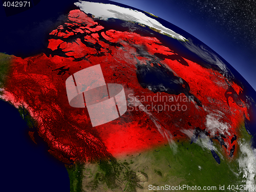 Image of Canada from space highlighted in red