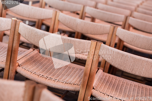 Image of Rows of seats inside church, selective focus