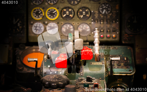 Image of Center console and throttles in airplane