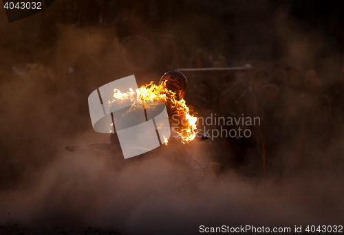 Image of fiery rider a quad bike