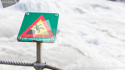 Image of Green square sign - Warning for risk of falling