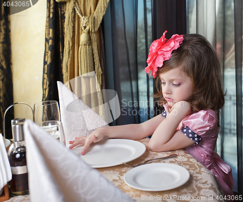 Image of girl at the dinner table