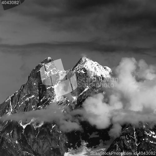 Image of Black and white view on Mt. Ushba in clouds