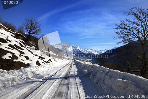 Image of Snow road in winter morning mountain