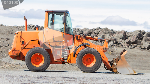 Image of Large orange bulldozer