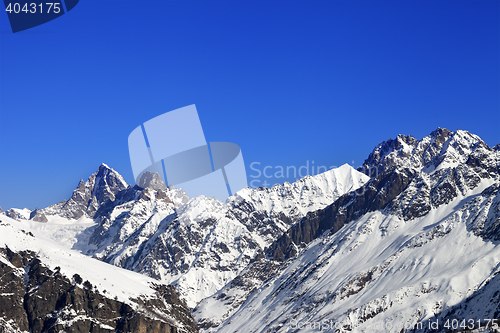 Image of Winter mountain peaks at sunny day
