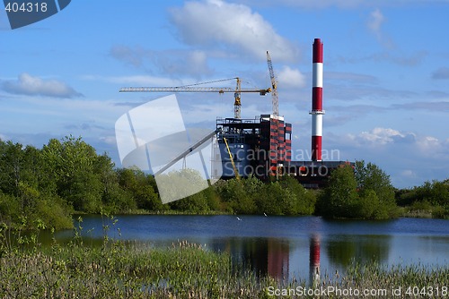 Image of cranes on construction in industriall factory