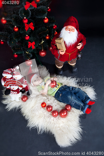 Image of child with xmas decoration