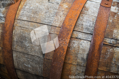 Image of close up of old wooden barrel outdoors