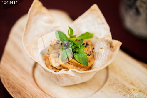 Image of close up of dough cornet with filling