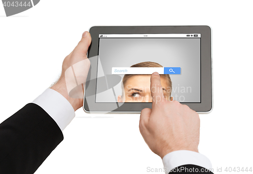 Image of close up of hands holding tablet pc with