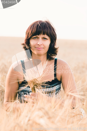 Image of beauty woman in barley field