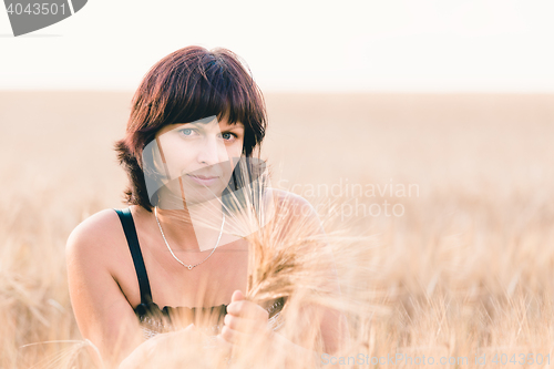 Image of beauty woman in barley field