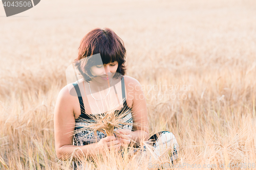 Image of beauty woman in barley field