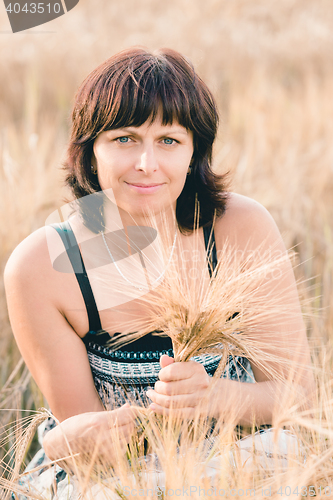 Image of beauty woman in barley field