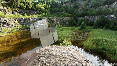 Image of abandoned flooded quarry, Czech republic