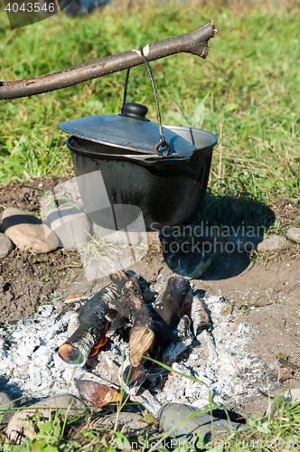 Image of Cooking over a campfire